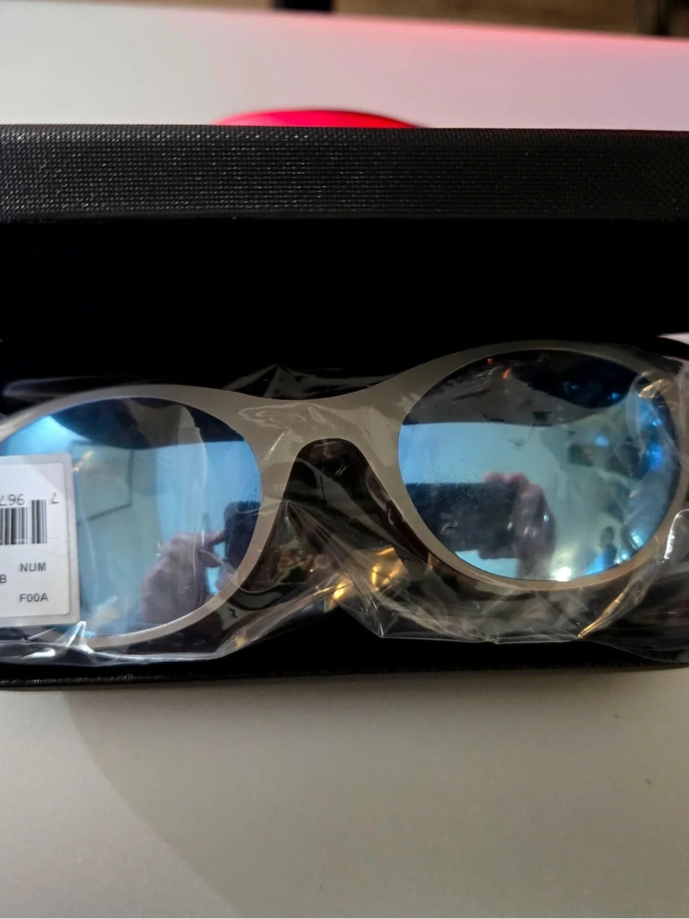 Revo Sunglasses - Satin Chrome Frame with Blue Mirror Lenses